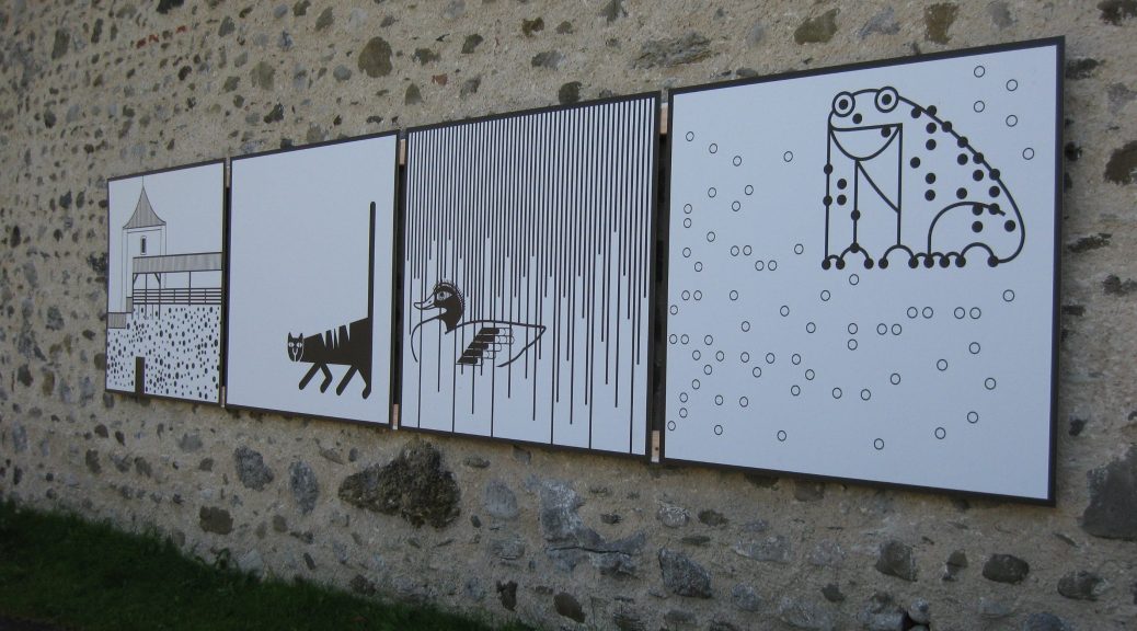 Piktogramme von Otl Aicher an der Stadtmauer Isny