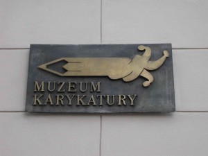 Wegweiser zum Warschauer Karikaturenmuseum